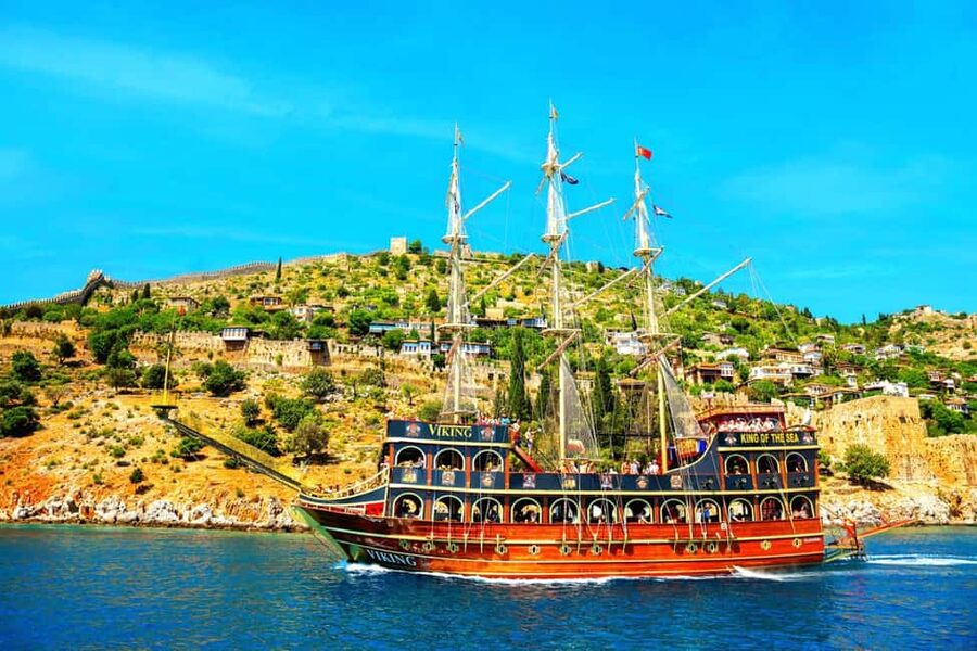 Alanya: Biggest Pirate Boat Tour with Soft Drinks and Lunch - A lively deck with music and foam