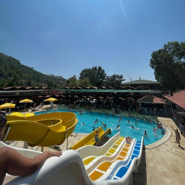 Alanya: Dim Cave, Dim River Tour With Lunch and Fresh Fruits - Dam lake photos and music on the bridge