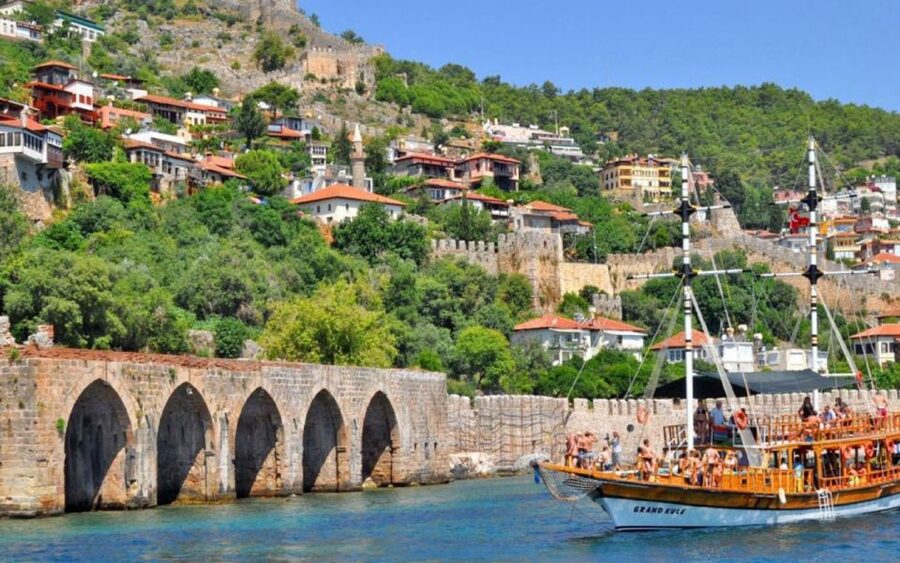 Alanya: Relax Boat Trip With Lunch & Swimming - Leaving Alanya Harbor with the Red Tower in view