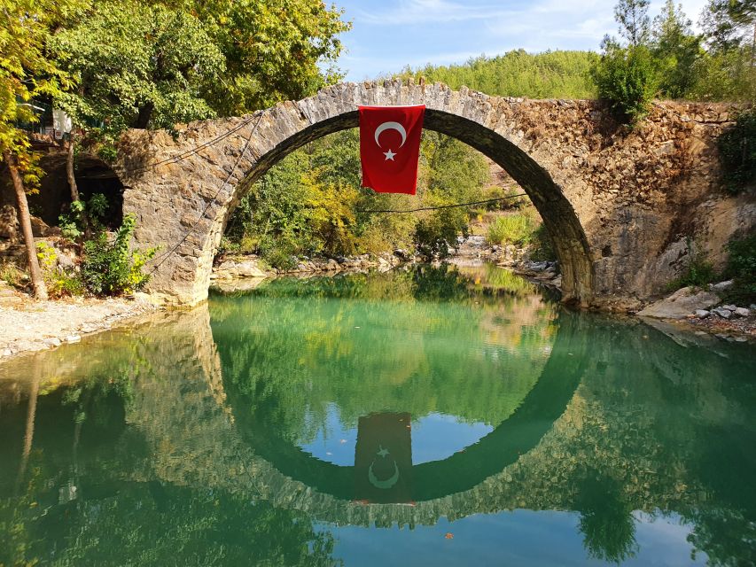 Alanya: Sapadere Canyon Waterfalls & Dwarfs Cave Tour - Village gardens, the Hercules Bridge, and riverside lunch