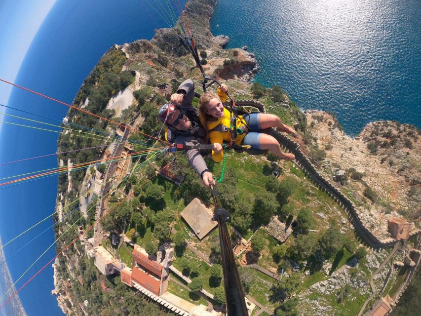 Alanya: Tandem Paragliding from 700m with Meeting or Pick Up - Landing on the beach and getting back