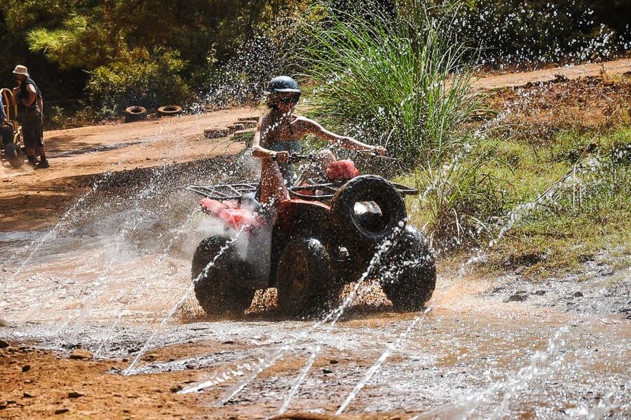 Antalya: Quad Safari Experience with Hotel Transfer - Rough tracks, pine trees, and riverbeds