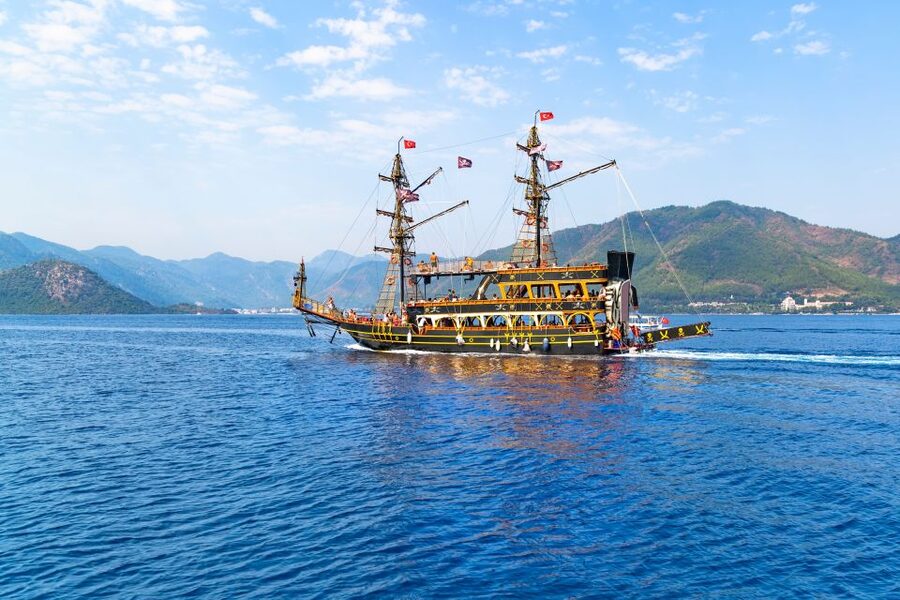 Bodrum: Pirate Boat Cruise with Lunch and Drinks - Black Island’s warm spring and five-minute mud bath