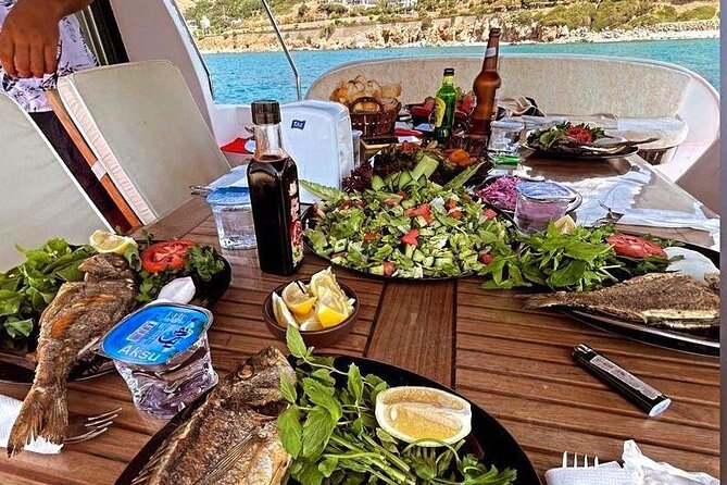 Bodrum Private Motor-Yacht Tour With Lunch For 6 Hours - Aquarius Bay: Fish, Lunch, and the First Swim