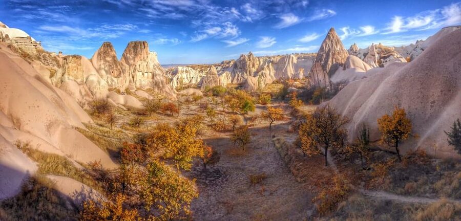 Cappadocia: Rose and Red Valley Hiking Tour - Walking through caves, vines, and narrow canyons