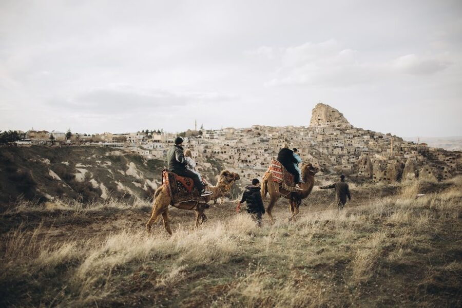 Cappadocia: Sunset or Sunrise Scenic Camel Ride - Riding toward Uçhisar Castle