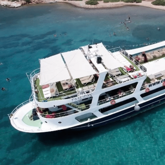 Cesme: Islands and Bays Boat Trip with BBQ Lunch - Donkey Island, a beach stop with a short walk