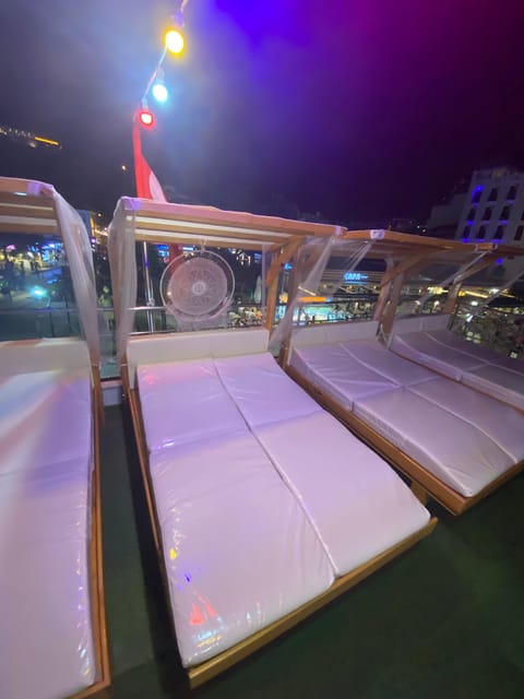 Cesme: Islands and Bays Boat Trip with BBQ Lunch - Four decks, loungers, and life onboard