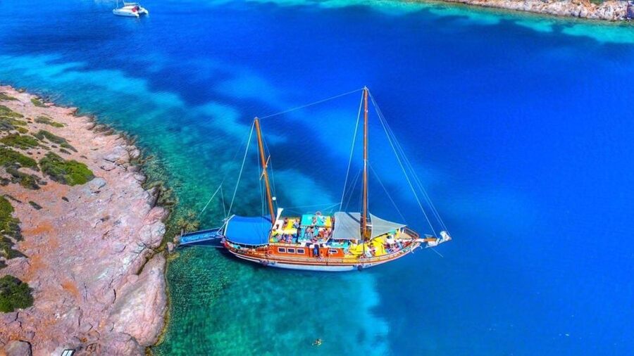 Cesme: Small Group Boat Tour with Open Buffet Lunch - Clear water, sandy shore, and free GoPro photos