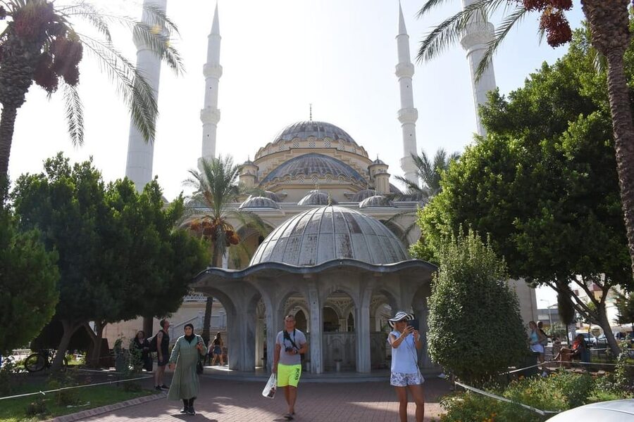 City of Side: Cabrio Bus & Green Lake Boat Tour with Lunch - Orange and banana gardens near the end
