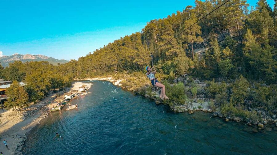 City of Side: Quad, Buggy, Rafting & Zipline Tour with Lunch - Rafting through cold, foamy water
