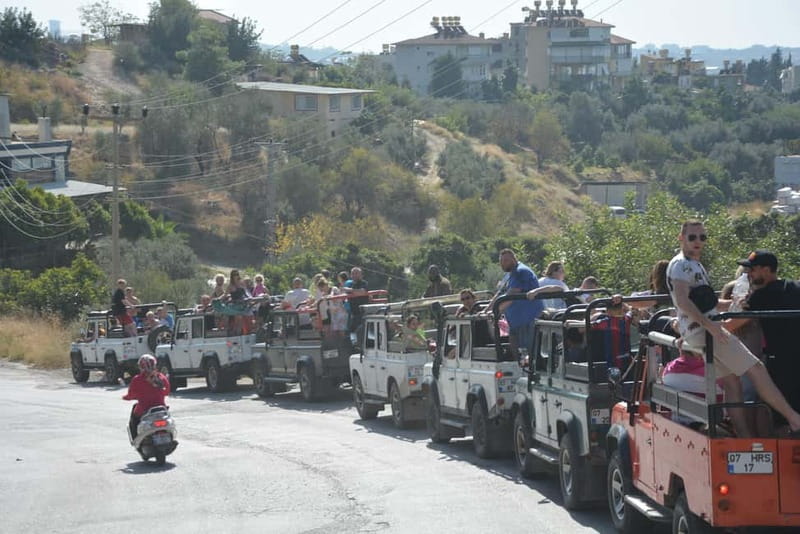 From Alanya: Jeep Safari with Lunch, Dim River & Cave - A Turkish village and local fruit