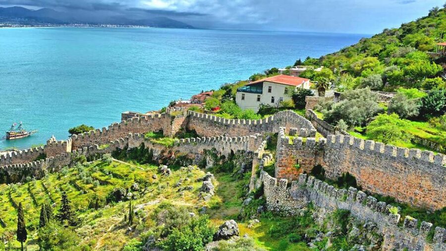 From city of Side: Guided Day Trip to Alanya City - Seeing the fortress from the harbor