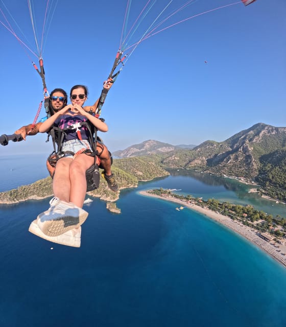 From Fethiye: Oludeniz Paragliding Trip with Transfer - Landing and the photo package
