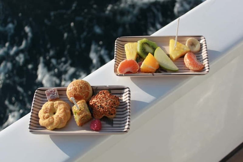 Istanbul: Bosphorus Private Guided Yacht Cruise with Snacks - Returning past Galata Bridge and Galataport