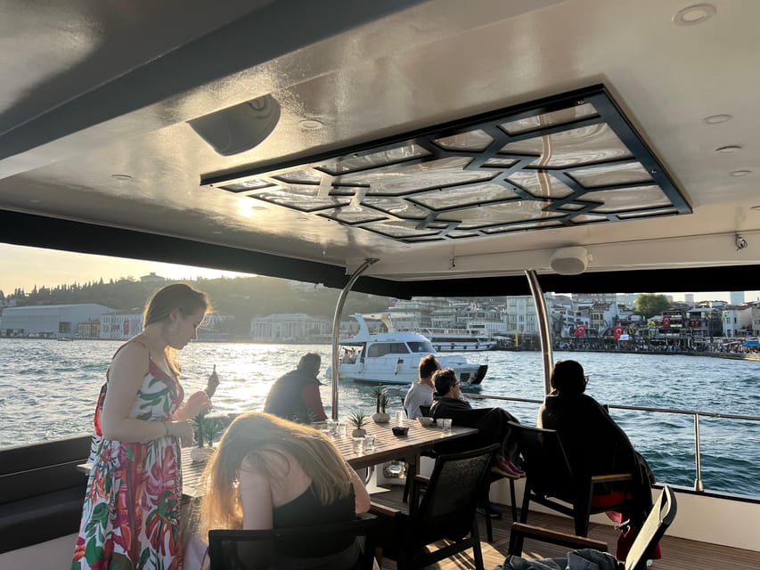 Istanbul: Bosphorus Sunset Cruise on a Luxury Yacht - Ciragan Palace and Ortakoy beneath the first bridge