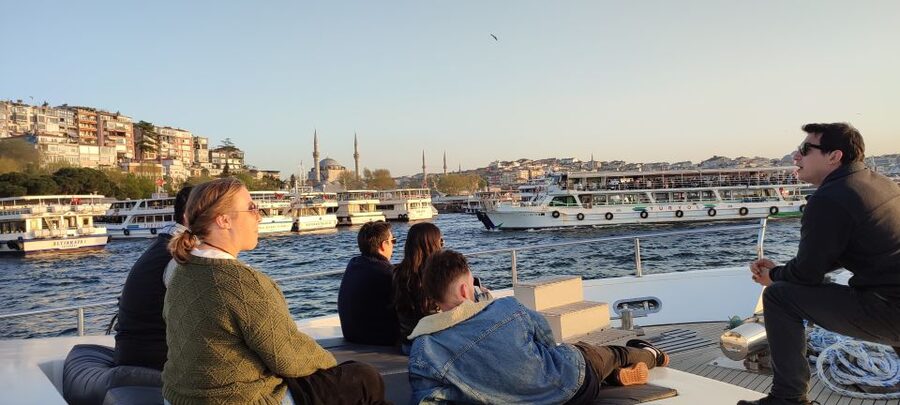 Istanbul: Bosphorus Sunset Cruise on Yacht with Live Guide - Bridges, waterfront homes, and Rumeli Fortress
