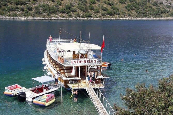 Ölüdeniz: Butterfly Valley Boat Trip with Buffet Lunch - Butterfly Valley, cliffs, and a stony beach